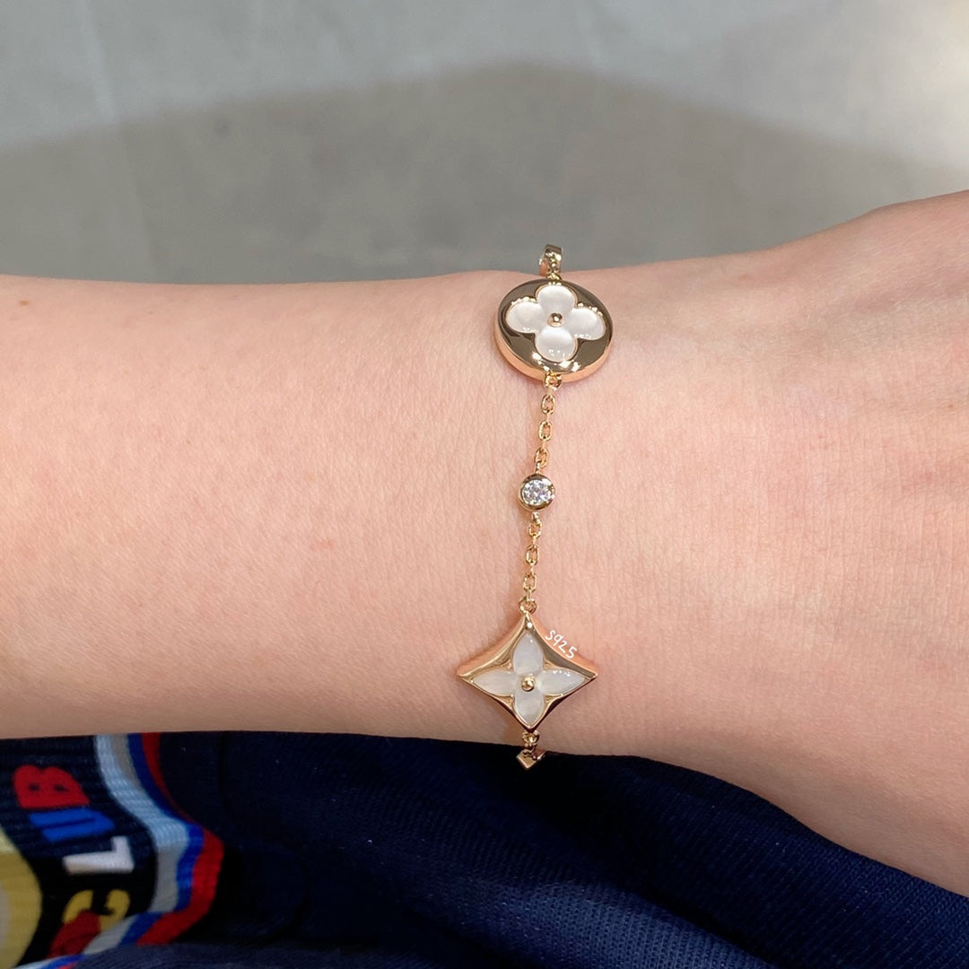 CCjewelry STAR AND SUN 4 MOTIF WHITE MOP PINK GOLD BRACELET L.V