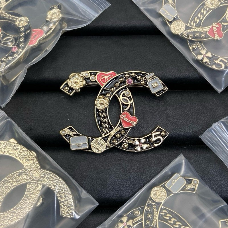 18K  CC1 Black & Red Heart Brooch