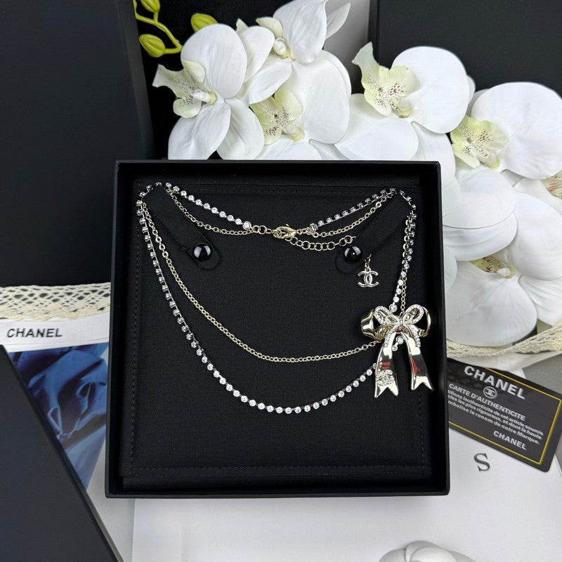 18K  CC1 25K Bow Tie Diamond Gold Necklace