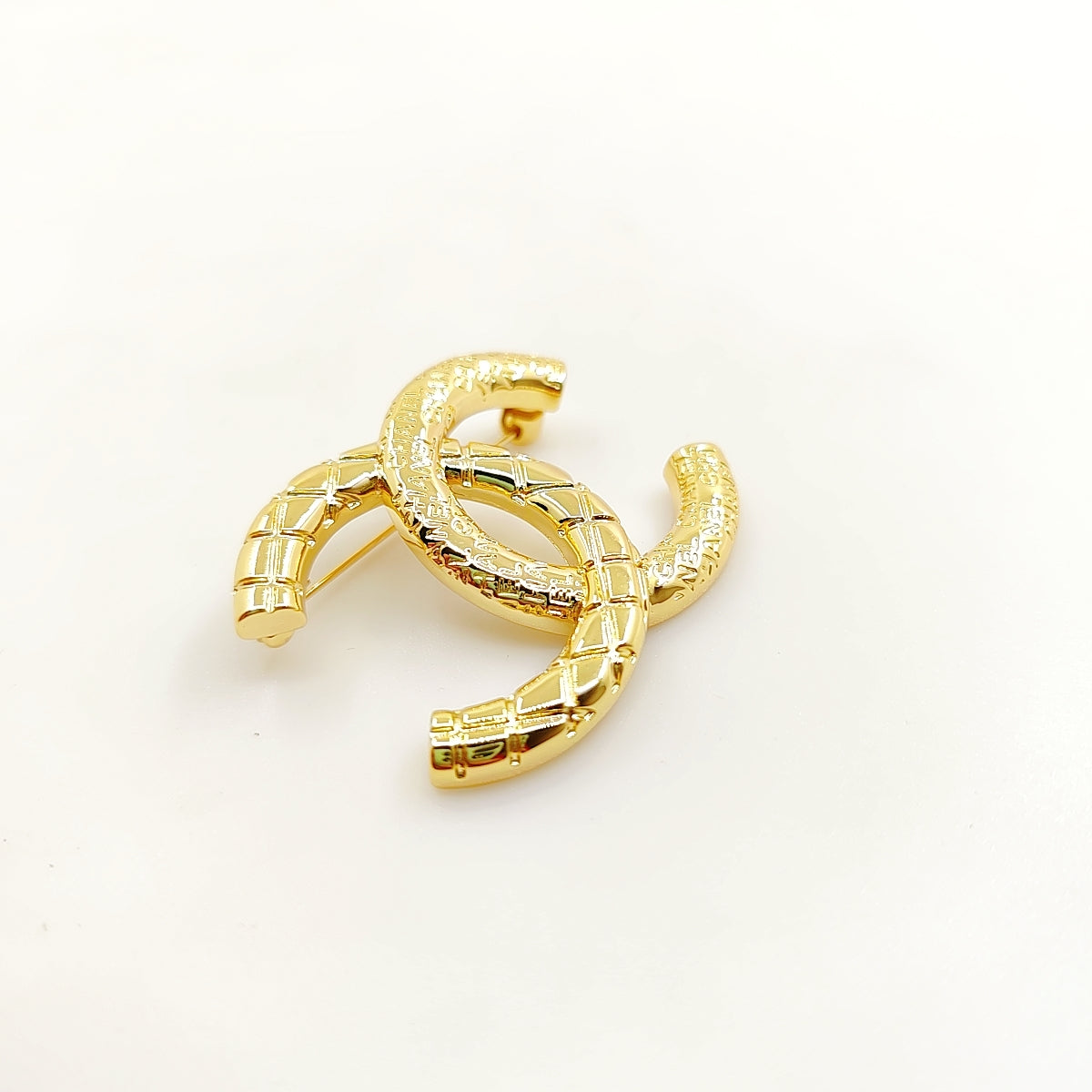 18K  CC1 24S Brooch