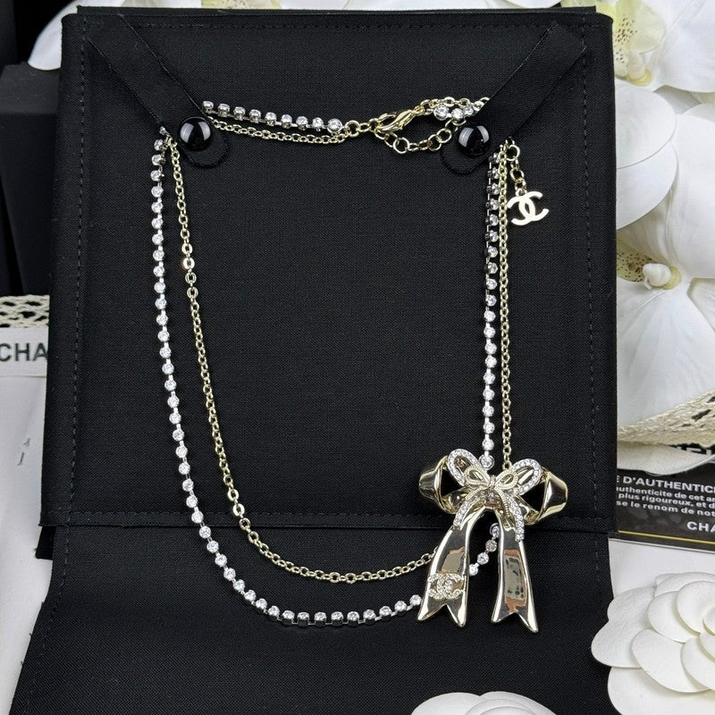 18K  CC1 25K Bow Tie Diamond Gold Necklace