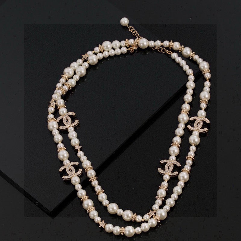 18K  CC1 26C Long Pearl Necklace